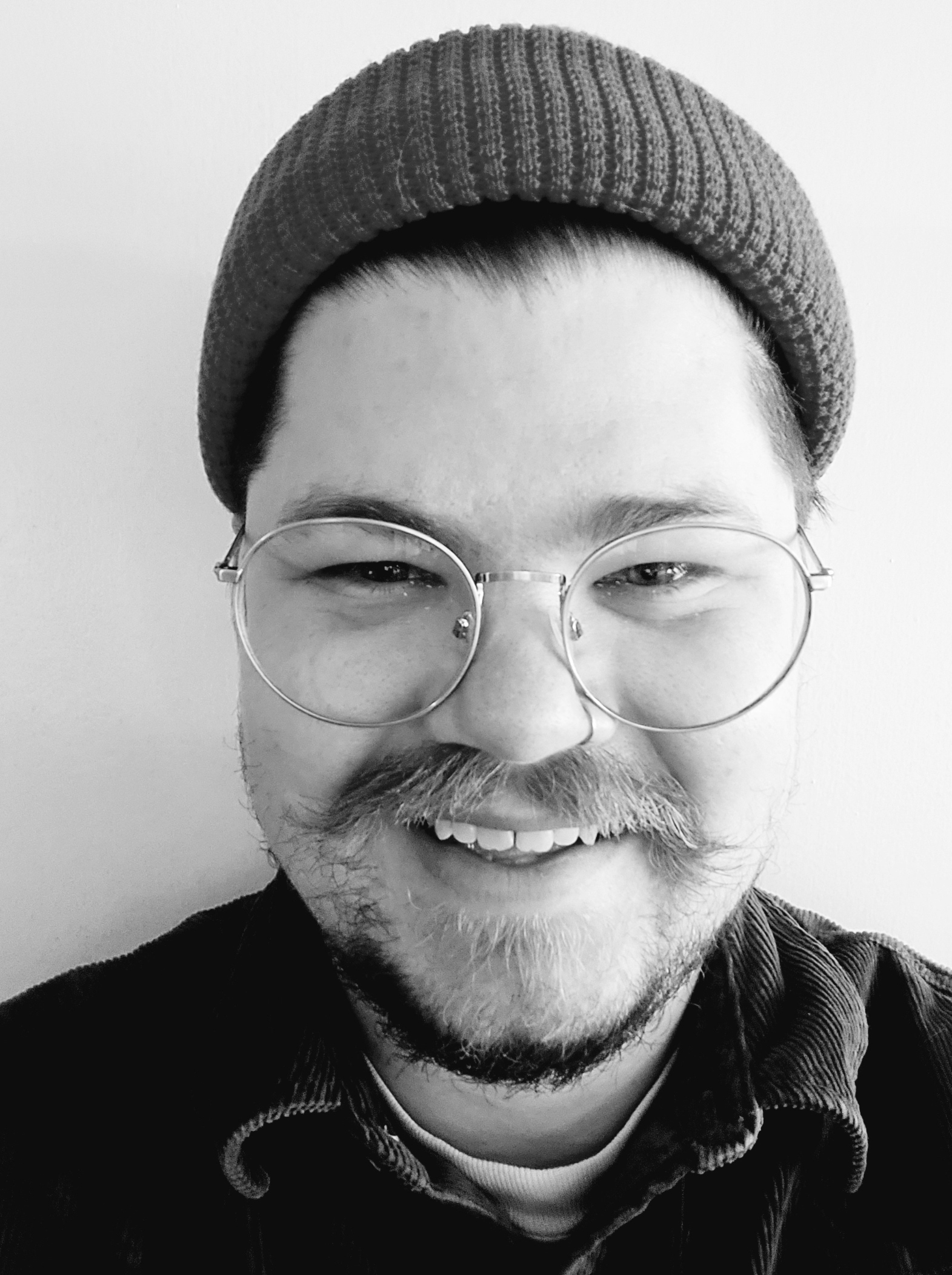 Black and white portrait of Logan Burkham
